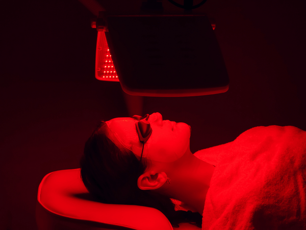 an image of a woman getting red light therapy