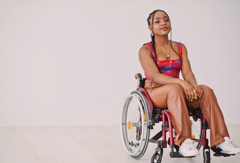 Pelvic health and disability: Young, stylish black woman in a wheelchair