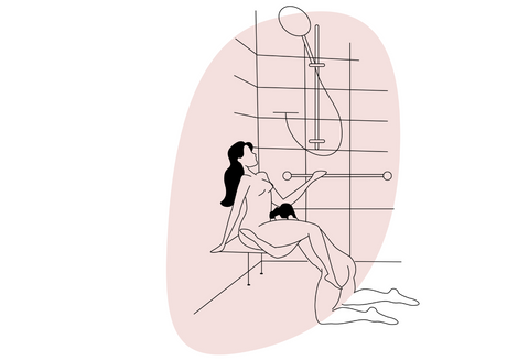 Sex positions for wheelchair users, woman sitting on a bathing stool is receiving oral sex from a man kneeling in front of her