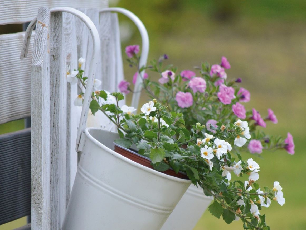 flower pots on fence