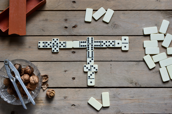 To play dominoes, you will need a set of dominoes. A standard set contains 28 tiles, but larger sets with up to 91 tiles are also available. You will also need a flat surface to play on.