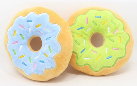 Blueberry and Lime Squeaky Donut Plush Toys placed on a blank background