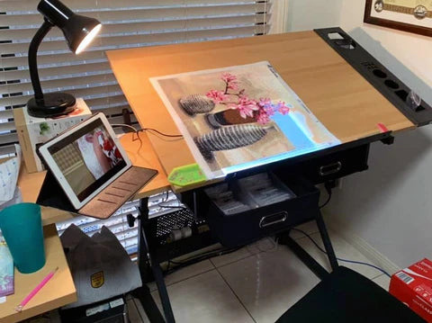 Hey guys! I've been doing diamond paintings for a couple years and my neck  and back get sore after a while. I was thinking about getting something  like a drafting desk that's