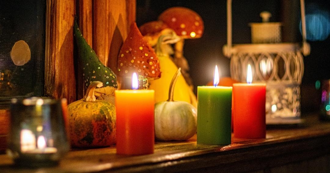 candles near halloween decorations creating a possible fire safety hazard