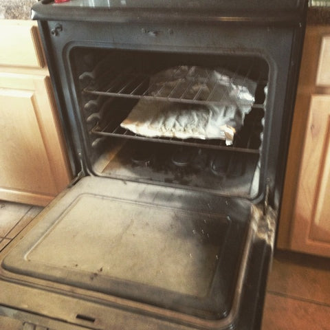 Aftermath of a oven after extinguishing fire with a traditional extinguisher