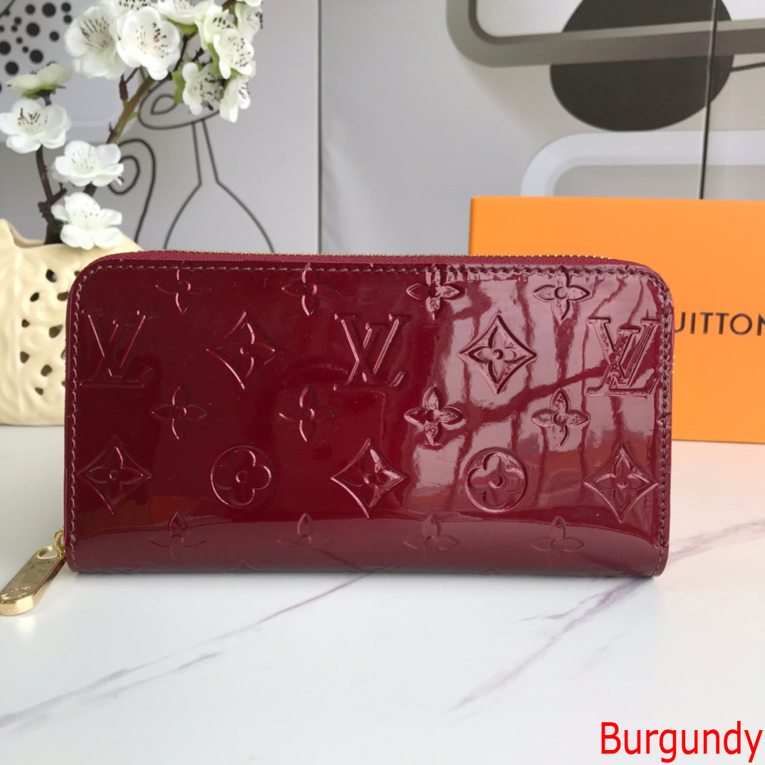 LV Louis Vuitton solid color embossed letters patent leather lon