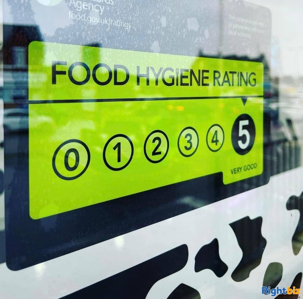 Food hygiene rating sticker in shop window