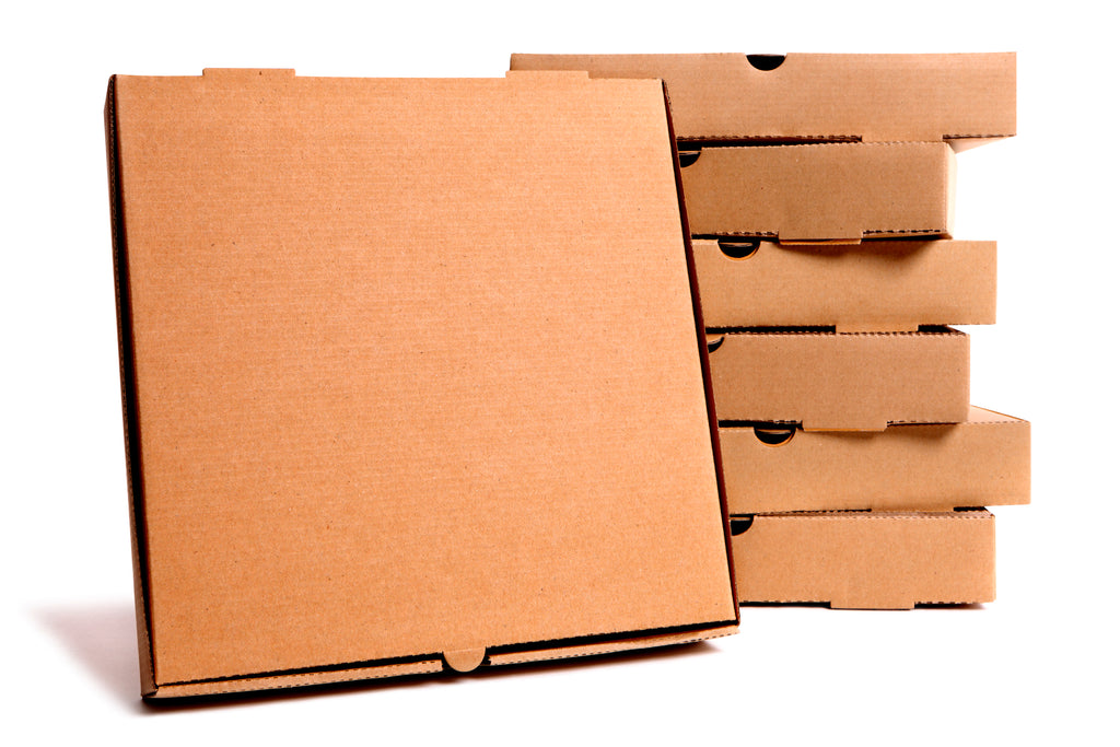 Pile of brown pizza boxes