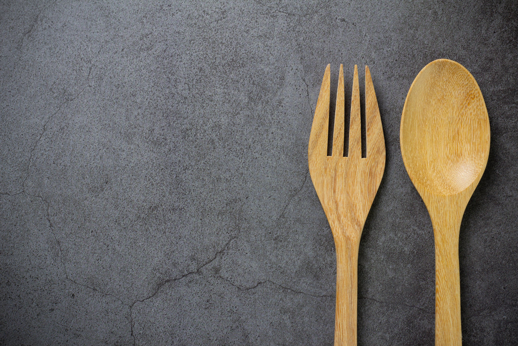 wooden spoon and fork on table