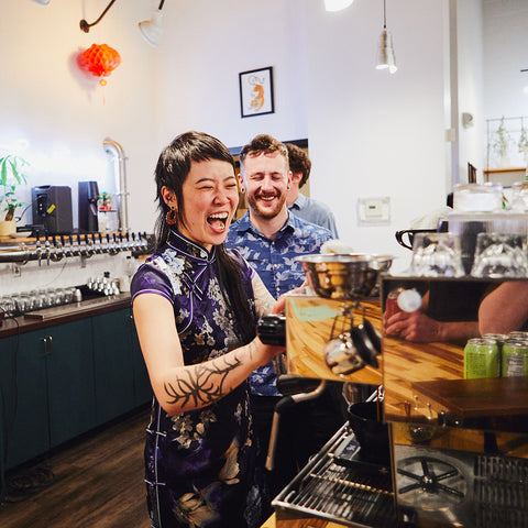 Kat (owner of Happy Gut Sanctuary) and a barista having a blast.