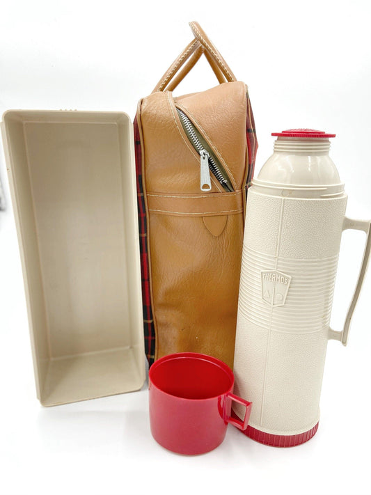 https://cdn.shopify.com/s/files/1/0513/9297/0939/files/vintage-picnic-set-1970s-thermos-brand-retro-plaid-bag-outdoor-dining-set-located-at-funkyhouse-vintage-antique-store-weiser-idaho-2_5a2fd981-751f-4078-9277-9598ccb9a3c8.jpg?v=1688593063&width=533