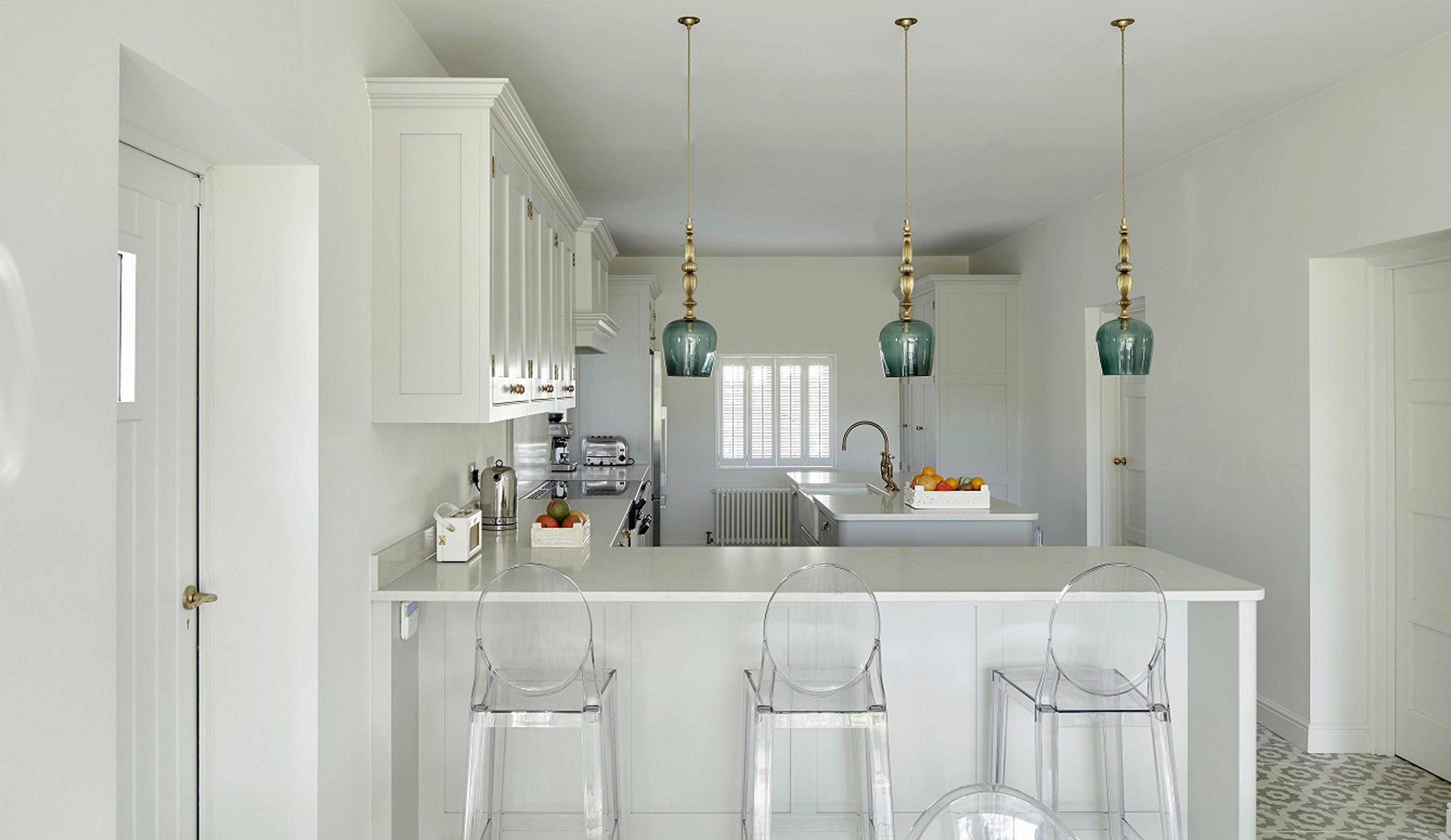 Standing Pendants by Rothschild &amp; Bickers over kitchen island by Higham Furniture