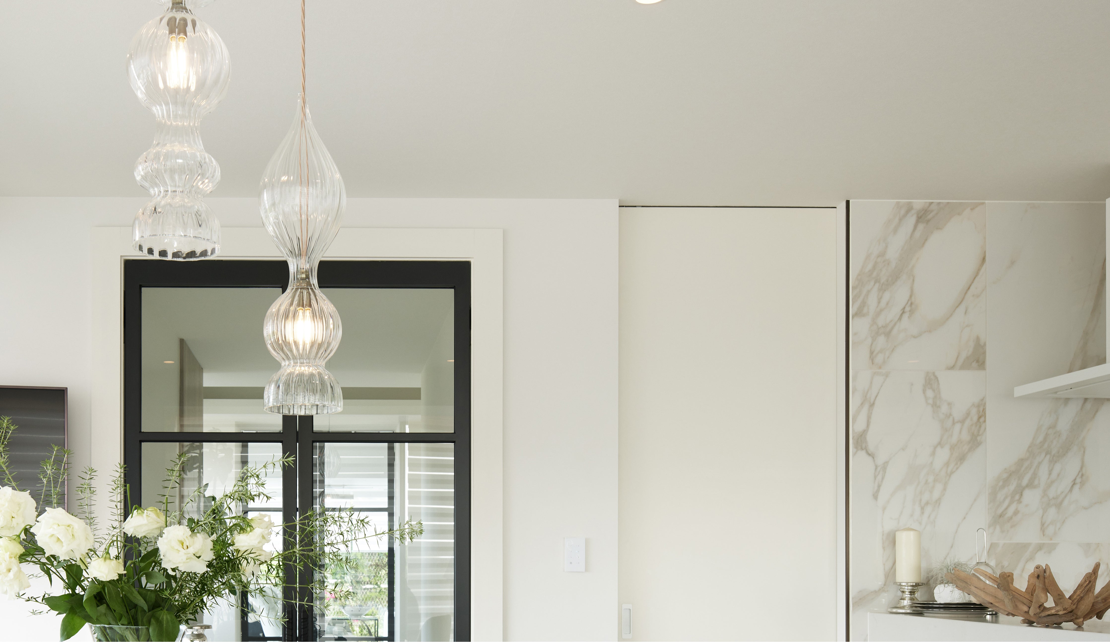 Spindle Pendants by Rothschild &amp; Bickers hanging over kitchen table