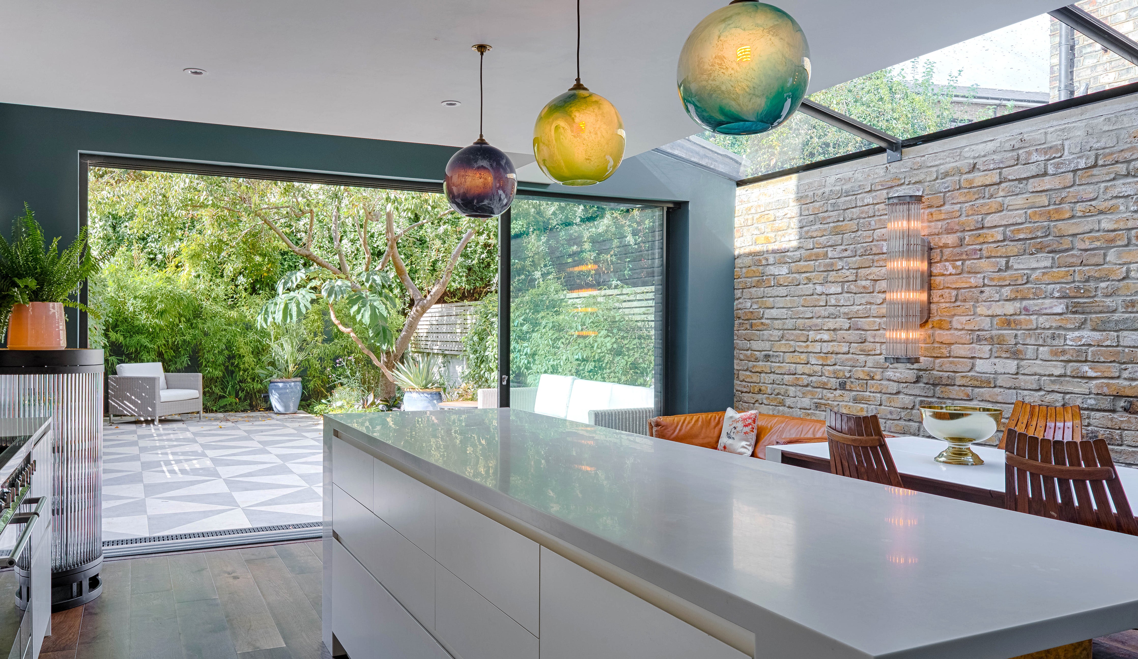 Mineral Pendant Lighting by Rothschild &amp; Bickers hanging over kitchen island by Sustainable Kitchens