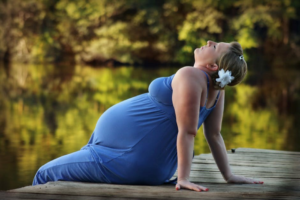 Image of a female leaning back relaxing in the sun.