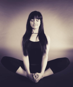 Health Kick - Image of a women meditating 