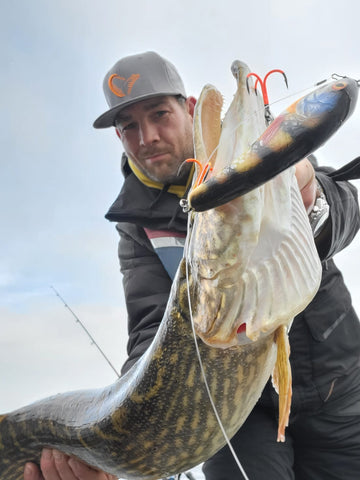 Patrick holding Pike with Forge of Lures Jerkbait in mouth