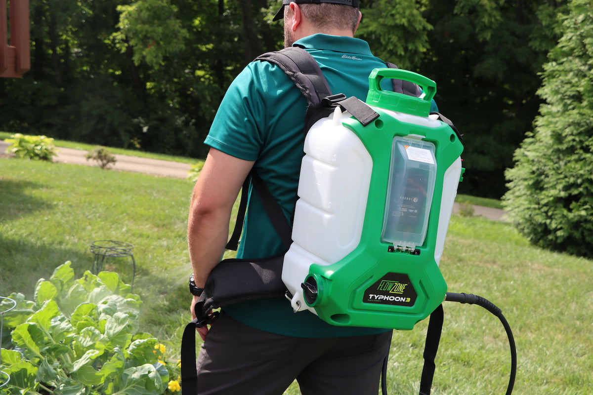 man wearing flowzone series 3 backpack sprayer