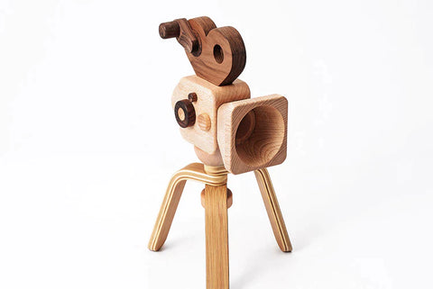 A toy wooden camera
