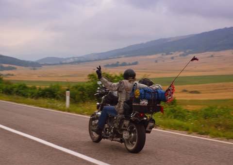 rider with luggage on motorcycle