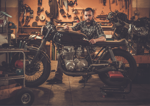 mechanic with motorcycle