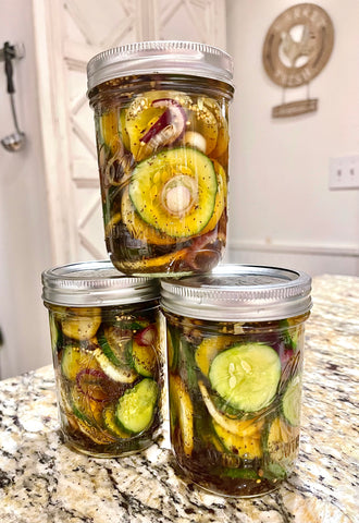 Canned jars of pickles copyrighted 2022 Grow Your Health Gardening