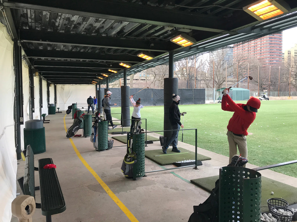 Heated tent for golf mats