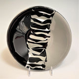 black, grey and white channel bowl