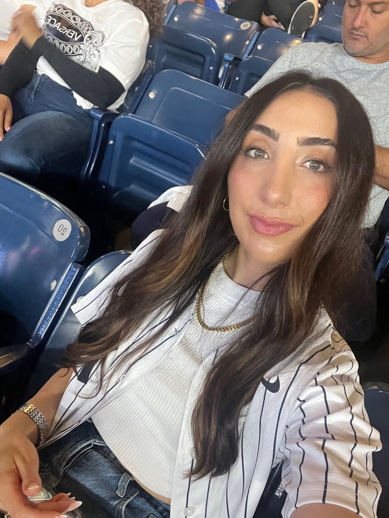 Image: Kat Moses with her CEE CLEAR Clear Purse at Yankee Stadium in New York City
