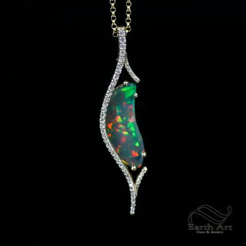 Black opal pendant in gold and diamonds