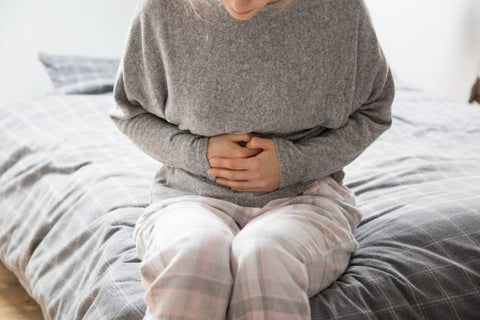 women with menstrual cramp pain