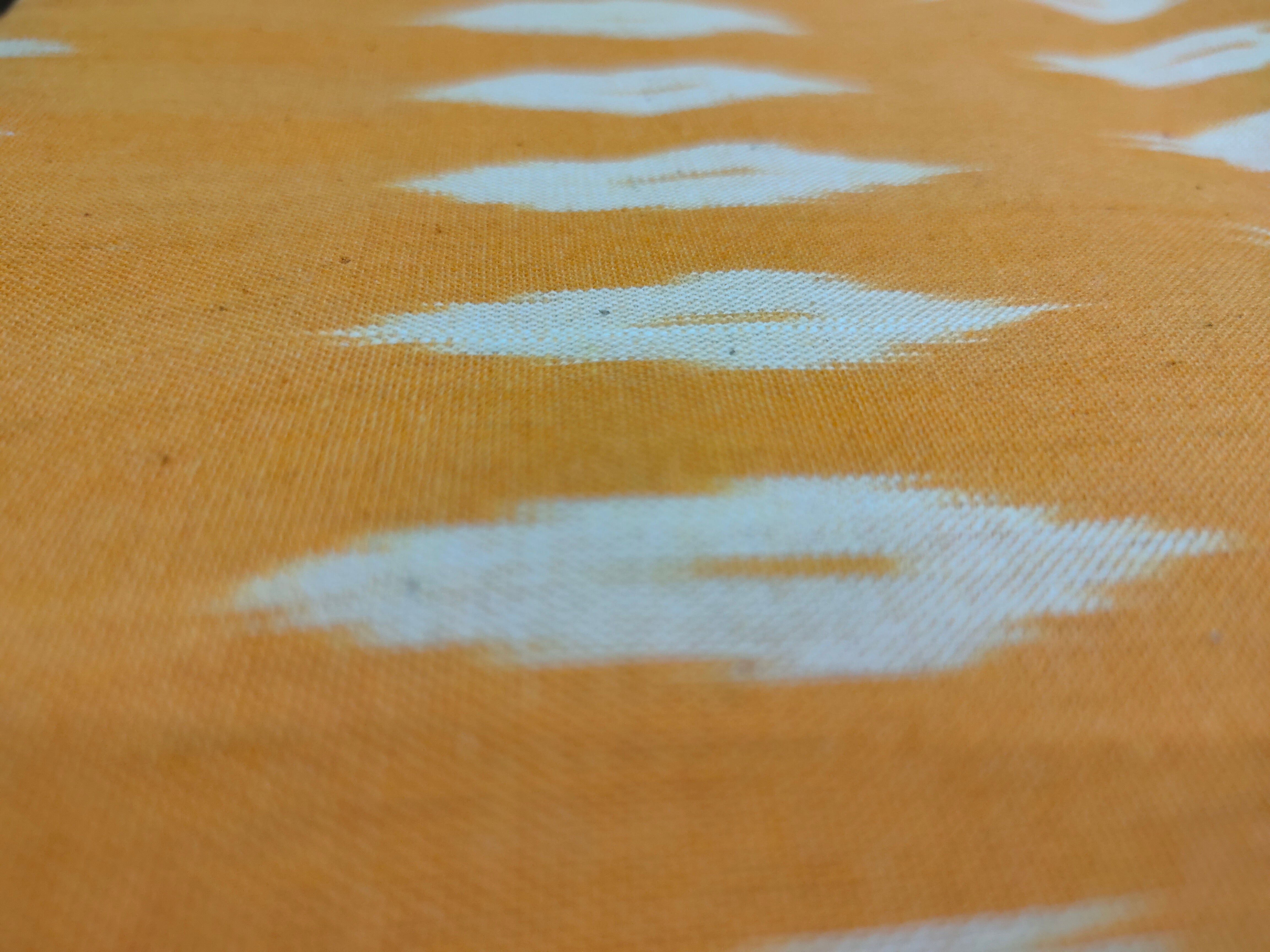 Orange & Off-White Cotton Ikat Printed Fabric
