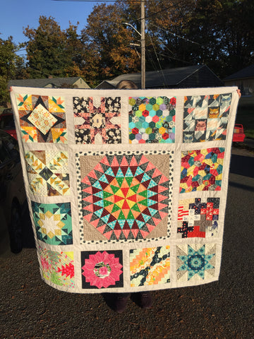 Quilt constructed using English paper piecing.