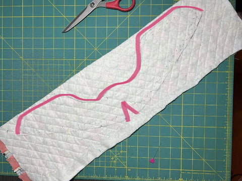 Highlight showing where to sew the quilted sneaker panels together.