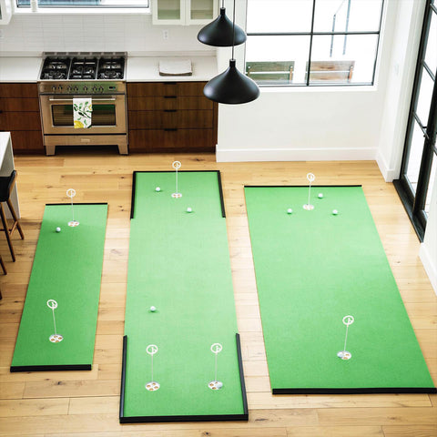 three varying sizes of putting green mats