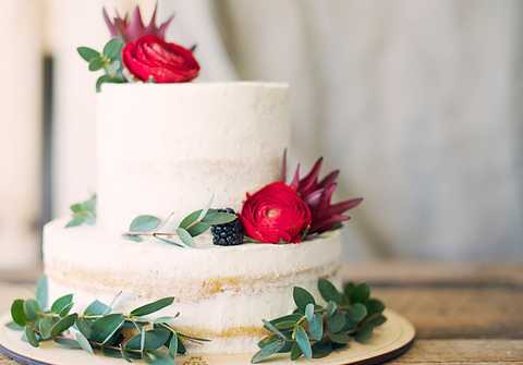 Cake designed with red preserved roses