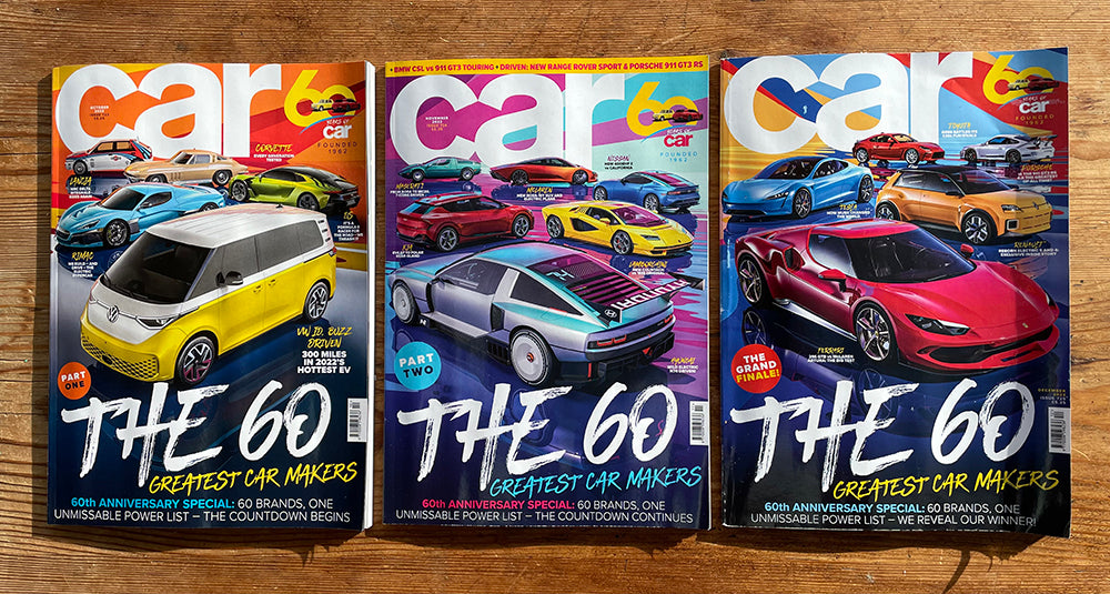 Three copies of the 60th anniversary edition of Car magazine