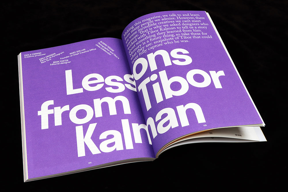 Open magazine spread, white text on purple background