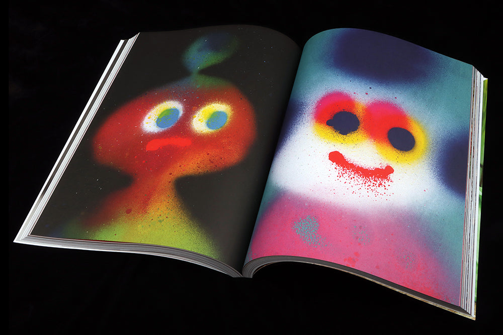 Muluicoloured spray paint patterns used to create faces and characters.