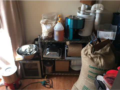 Supplies in a dorm closet that were used to make Honeymoon Chocolates, such as cacao pods and a grinder