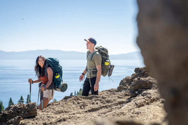 Couple backpacking with EcoSimmer in Lake Tahoe
