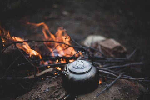 Campfire kettle at campsite