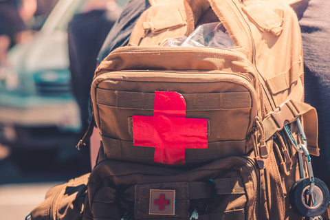 Man wearing medic backpack full of equipment