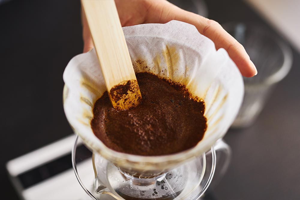 Artisan Coffee co V60 brew guide tespoon 30 seconds pour ground coffee water off the boil