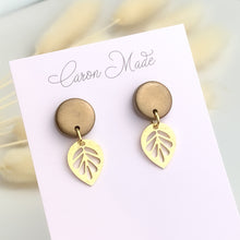 Load image into Gallery viewer, Bronze earrings with leaf charm
