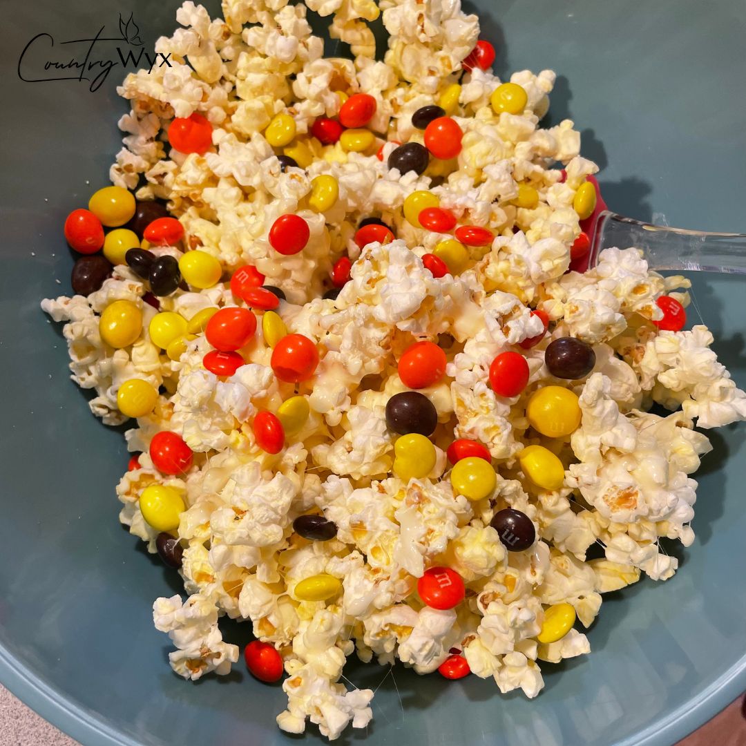 Spooky Scarecrow Popcorn - adding the m&ms