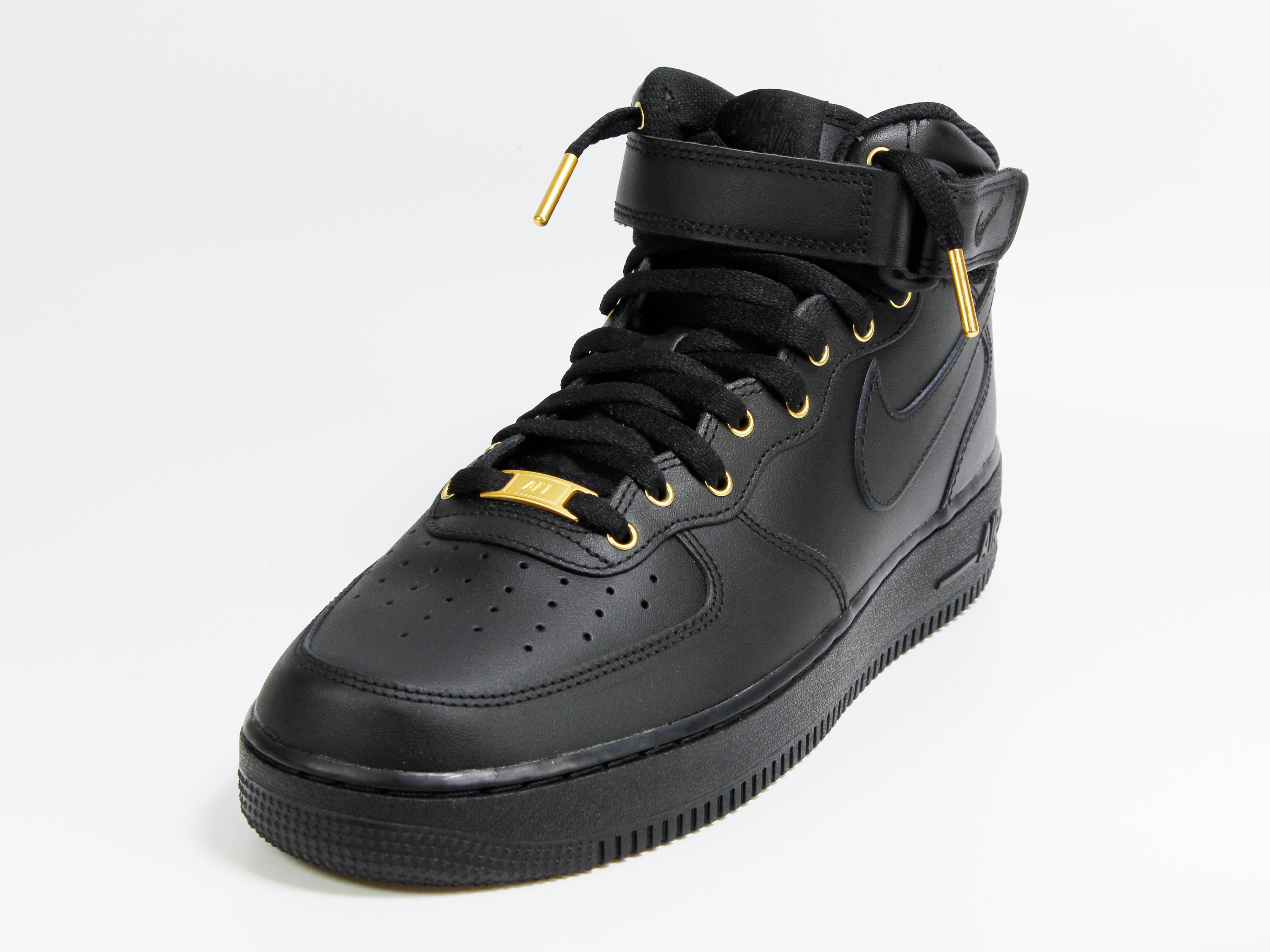 nike air force 1 mid black and gold