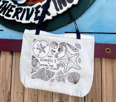 New Dunsel's Tote with seashell artwork on the face of the bag.  