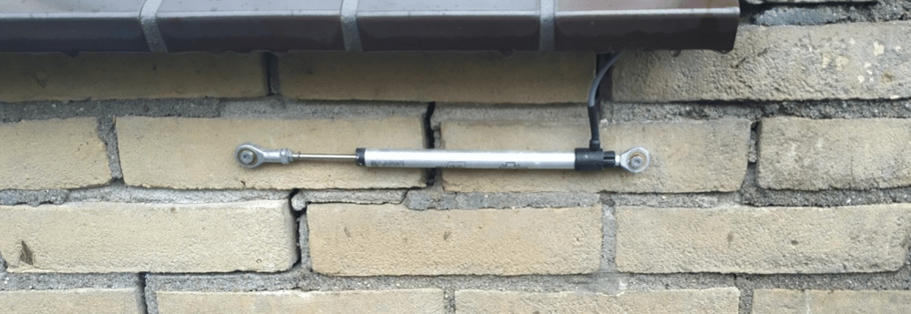 a linear potentiometer measuring a crack in a wall