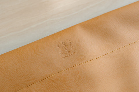 Within & Co vegan leather mat logo